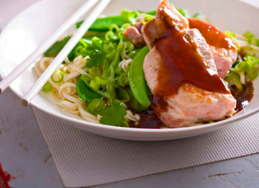 Plum Pork Steaks With Noodles And Sugar Snap Peas
